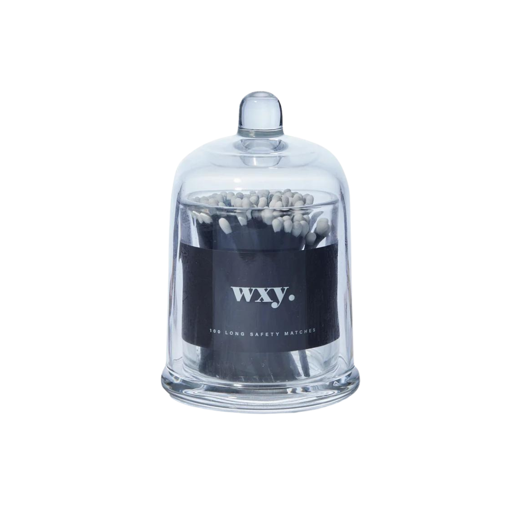 Wxy. cloche matches comes in a sturdy and timeless glass vessel – a reusable vessel for restocking of other household items - that contains 100 matches in black. the striker is found on the back of the glass.