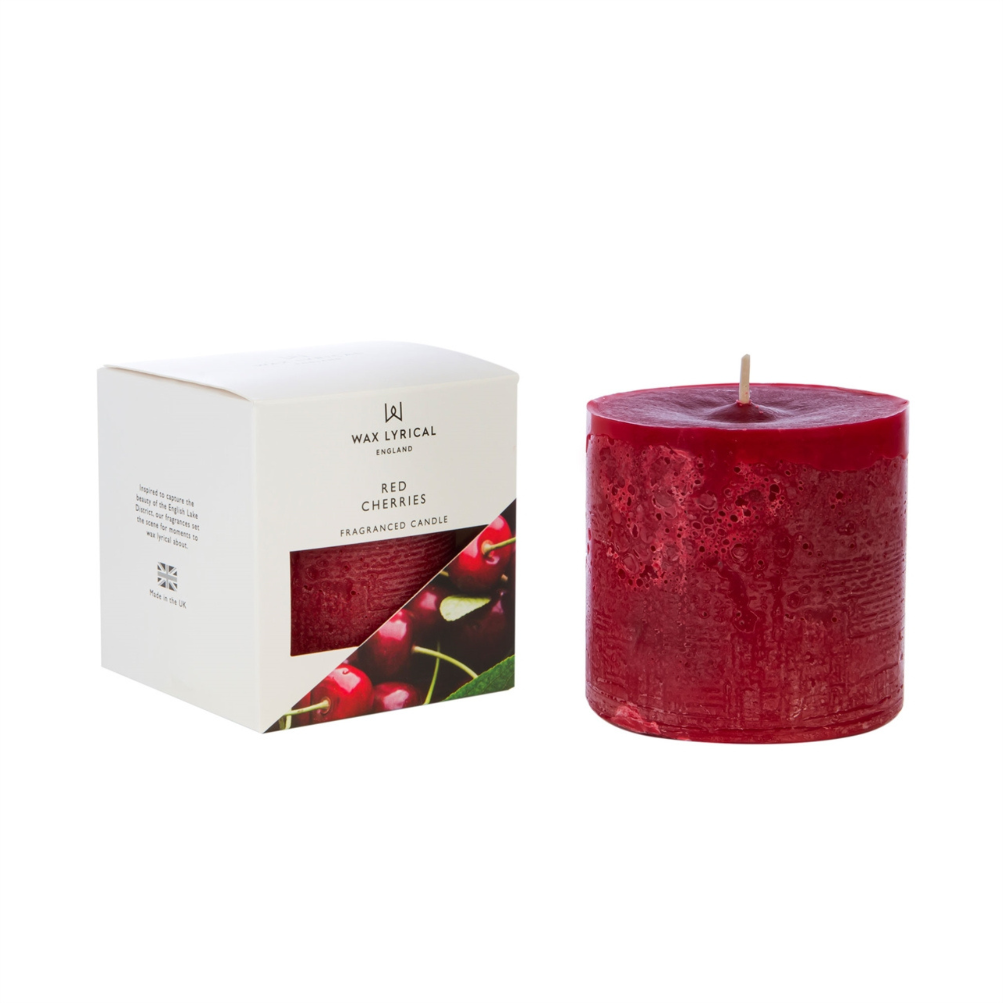 Wax Lyrical Made In England Red Cherries Pillar Candle. A juicy, rich cherry fragrance with subtle fruity notes of raspberry and pear, supported by a base of velvety sweet vanilla. Inspired to capture the beauty of the English Lake District, Wax Lyrical fragrances set the scene for moments.