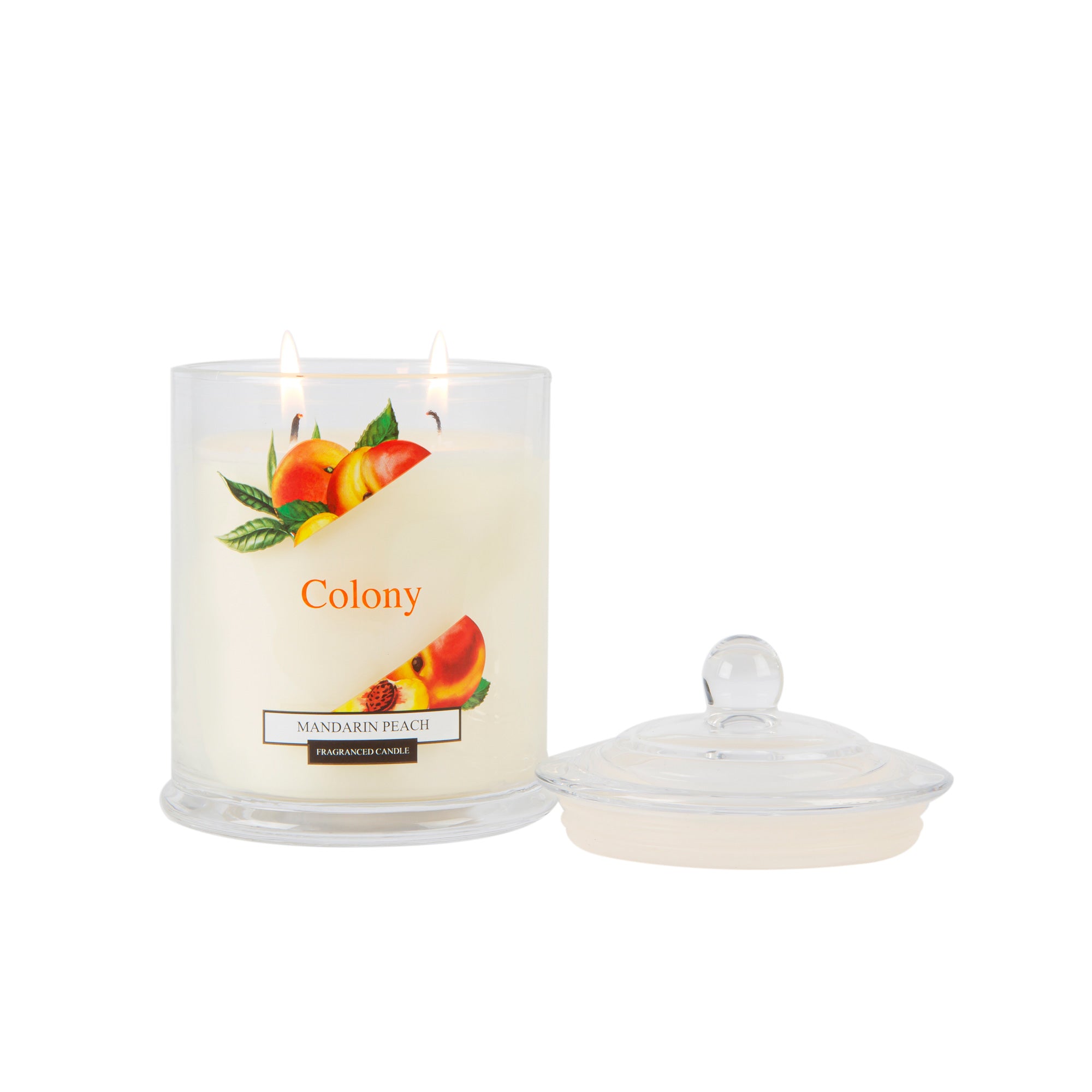 Wax Lyrical Colony Mandarin Peach Medium Candle. Mandarin, peach together with zesty lime, earthy basil, fresh lemongrass in this fruit bowl fragrance. Spearmint and moss and vetivert base create a scented base.