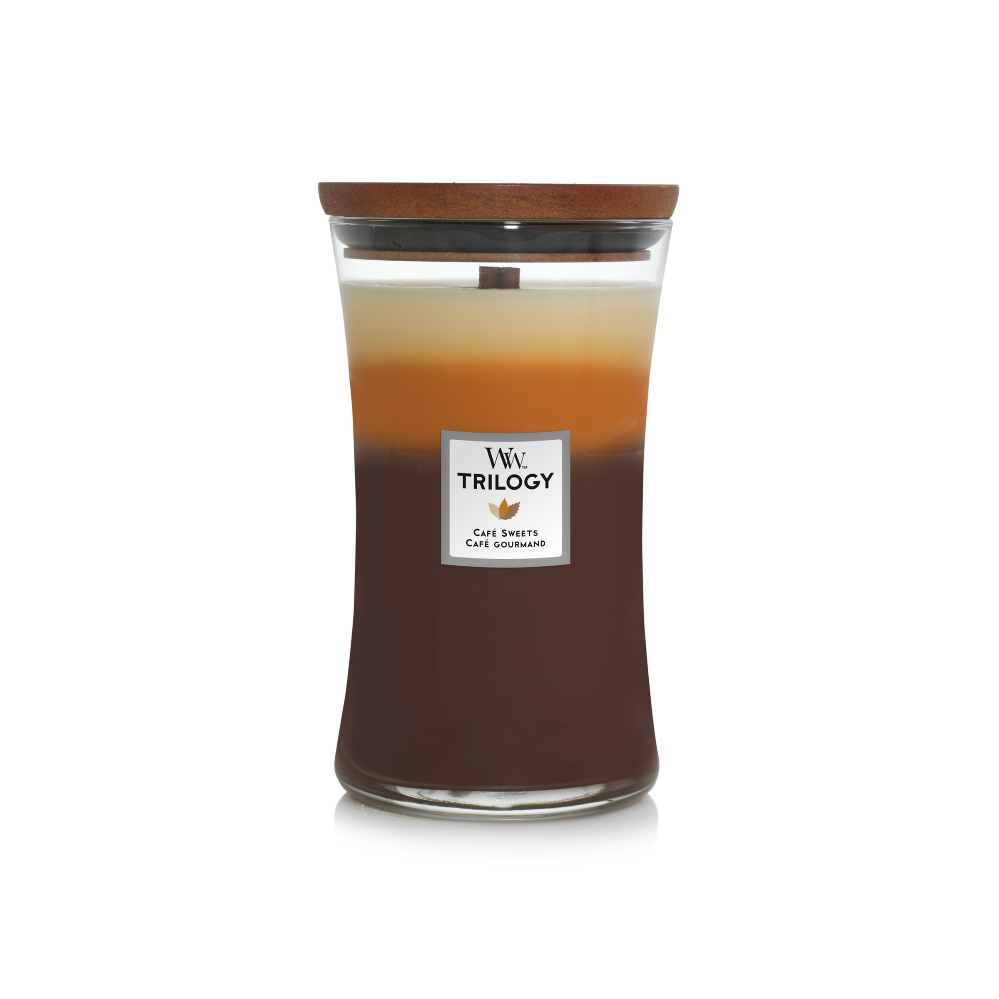 WoodWick Cafe Sweets Large Trilogy Candle. A unique ambiance as the fragrance layers melt together.