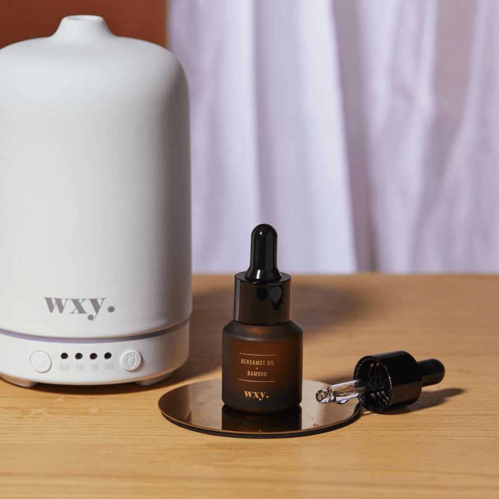 Wxy. Luxury Bergamot + Bamboo Fragrance Oil (15ml). Zesty bergamot with fresh rain-soaked bamboo - the invigorating scent. Immerse your home by adding 3-8 drops as desired to your electronic reed diffuser.