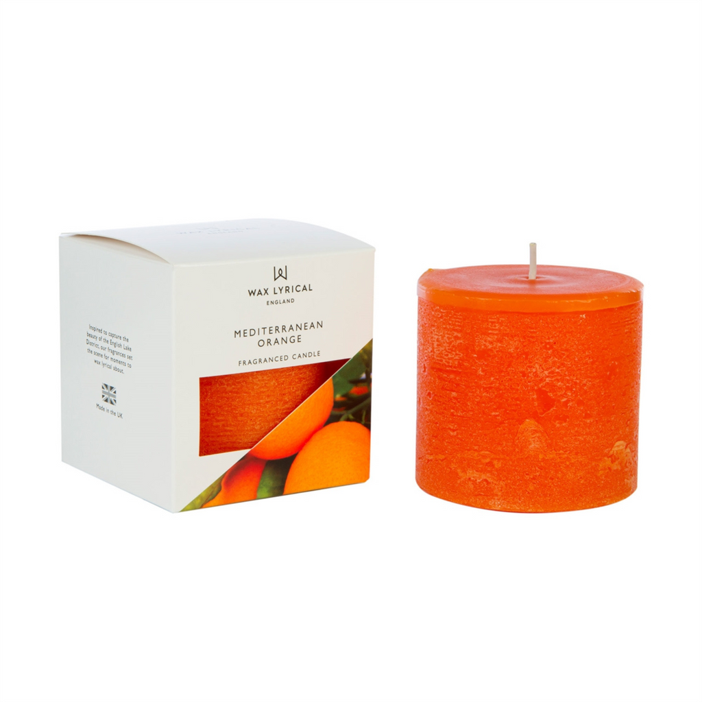 Wax Lyrical Made In England Mediterranean Orange Pillar Candle. A fresh sparkling citrus fragrance with orange, grapefruit, lemon and mandarin supported by light floral notes of jasmine and neroli. Inspired to capture the beauty of the English Lake District, Wax Lyrical fragrances set the scene for moments. 