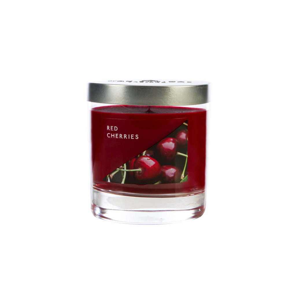 Wax Lyrical Made In England Red Cherries Medium Tin Candles. Cherries spritz in this fruity fragrance, ripe strawberries and raspberries add rich red zest. Floral violet and vanilla create a sweet base. 