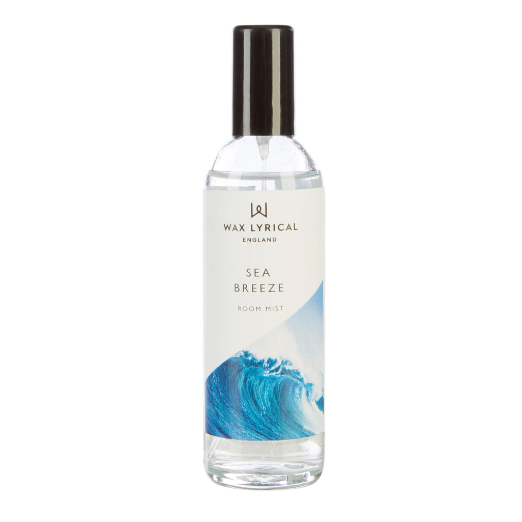 Wax Lyrical Made In England Sea Breeze Room Mist. A refreshing fragrance brings watery notes to your home. A floral heart, fresh figs and woody notes, amber and musk