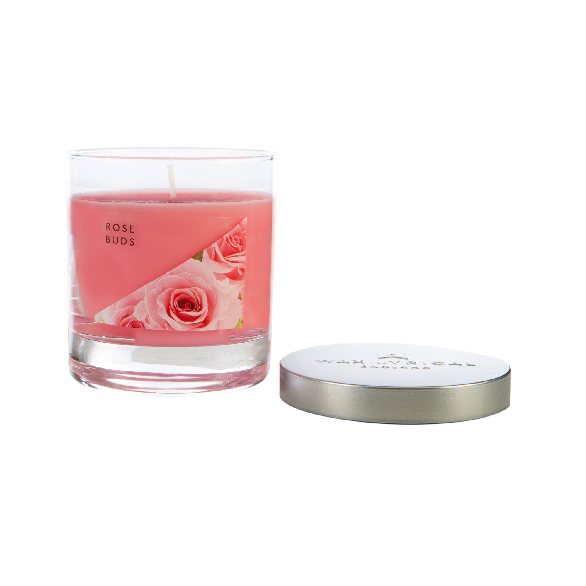 Wax Lyrical Made In England Rose Bud Medium Tin Candles. Fresh cut roses flourish in this scent, with floral notes of iris, gardenia all arranged for a lovely musk finish. This candle is a luxury addition to the home and is exploding with fragrance. 