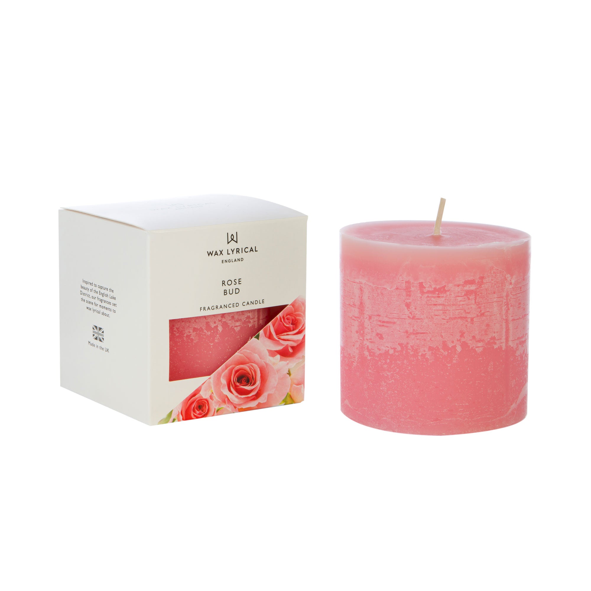 Wax Lyrical Made In England Rose Bud Pillar Candle. Fresh cut roses flourish in this scent, with floral notes of iris, gardenia all arranged for a lovely musk finish. This pillar candle is a luxury addition to the home and is exploding with fragrance.